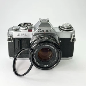 Cámara fotográfica Canon AV-1 35 mm SLR cámara manual con lente Canon 50 mm f/1,8 FD Lomo - Imagen 1 de 14
