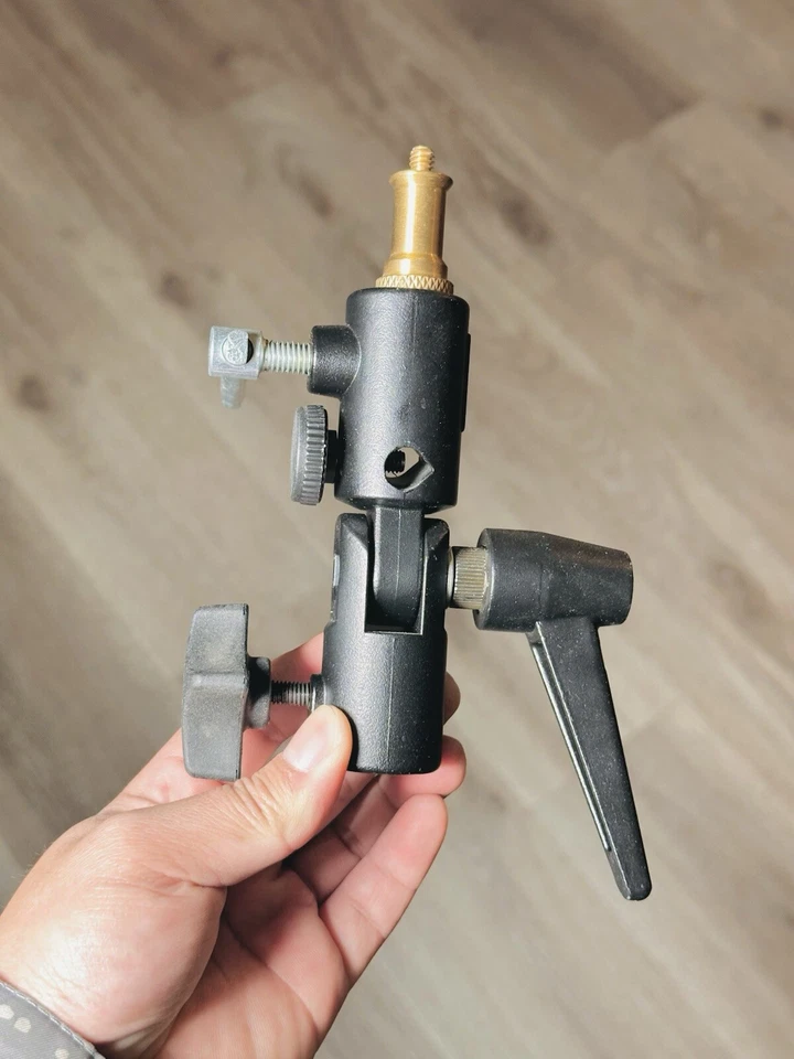 Adaptador de paraguas giratorio Manfrotto 026 Lite-Tite con soporte de flash de pernos Foto 1 de 1