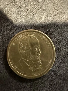 Moneta da un dollaro USA Rutherford B. Hayes 19° Presidente (1877-1881) 2011 (D) - Foto 1 di 3