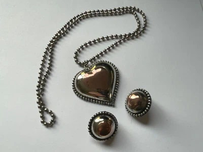 Colgante y pendientes de corazón de plata y cobre Foto 1 de 4