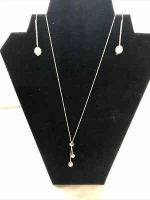 Juego de collar y pendientes colgantes Claires tono plata estrás bola discoteca Foto 1 de 2