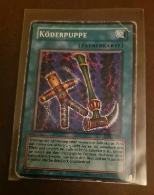 Yu-Gi-Oh! GERMAN Bait Doll LON-G096 1st Edition MP(-) Spell Card Köderpuppe - Image 1 of 2