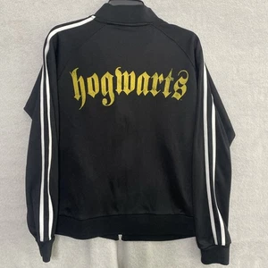 Chaqueta deportiva Harry Potter marca Hogwarts 4 casas cremallera completa negra talla mediana de colección - Imagen 1 de 14
