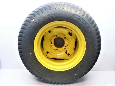 Llanta trasera y neumático Deere GT275, 13”, 5 orejetas Titan Multi Trac G/S 23 X 10,50 X 12 (1) Foto 1 de 3