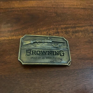 DE COLECCIÓN AÑOS 70 *MARRÓN MEJOR EN EL CAMPO* PISTOLA Y HEBILLA DE CAZA Indiana Metal - Imagen 1 de 3