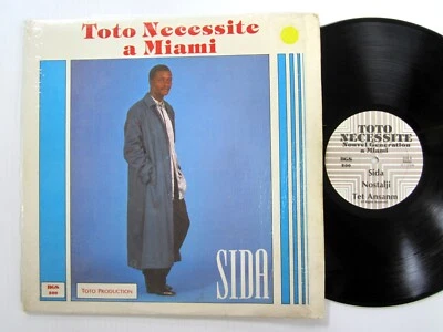 SIDA Toto Necessite a Miami LP 1987 Latin Compas VG++ vinyl    a8234 - Image 1 of 3