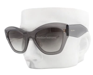 Gafas de sol Miu Miu SMU 11P ROY-0A7 gris transparente con logotipo dorado - LEER - Imagen 1 de 10
