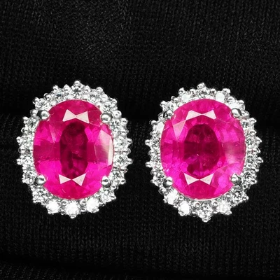 Preciosos pendientes con halo de oro blanco de plata de ley 925 ovalados de rubí rosa de 6,65 quilates Foto 1 de 4