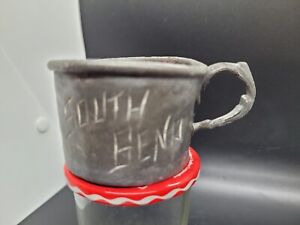 Antique Pewter Cup Mug w Ornate Handle Marked hand carved "South Bend" 