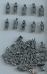 LEGO x 40 Dark Bluish Gray Plate, Modified 1 x 2 with Clip on End Horiz Grip - Picture 1 of 1