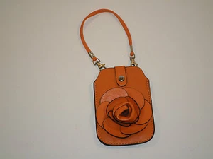 Soporte de pulsera para teléfono celular Mellow World naranja roseta súper lindo para mujer  - Imagen 1 de 3