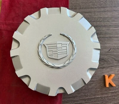# K 1) 2003-2006 Cadillac SRX OEM 17" Silver Wheel Center Cap 9596272 - Image 1 of 4