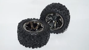 Neumáticos extremos ensamblados Traxxas 2.8 negros cromados (2) 6773X - Imagen 1 de 1