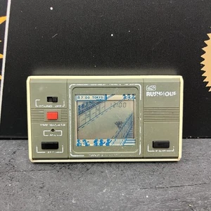 Bandai Rush hour LCD Handheld Time Game TESTED FREE TRACKED POSTAGE - Picture 1 of 6