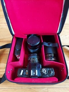 Minolta X-7 Kamera mit Objektiv 1:2,8 28 mm Brennweite, Minolta Objektiv 1:1,7 50 mm, mit Tasche - Bild 1 von 23