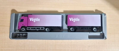 Herpa 149471 VOLVO FH GL Vogele Mode boxed truck original packaging 1:87 - Image 1 of 3