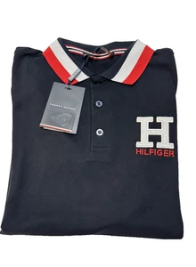 Camisa polo de algodón para hombre Tommy Hilfiger talla S negra con logotipo rojo con ribete suave - Imagen 1 de 6