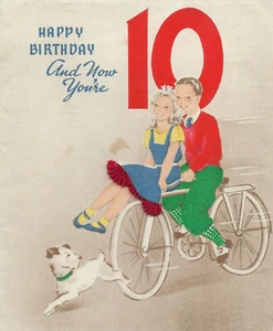 Tarjeta de felicitación de tela real vintage 1943 niño y niña en bicicleta y perro cumpleaños g1 - Imagen 1 de 4