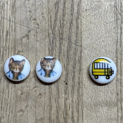 (3) Vinage JHB Decorative 1/2” Shank Buttons | Beatrix Potter Cat / School Bus - Image 1 of 2
