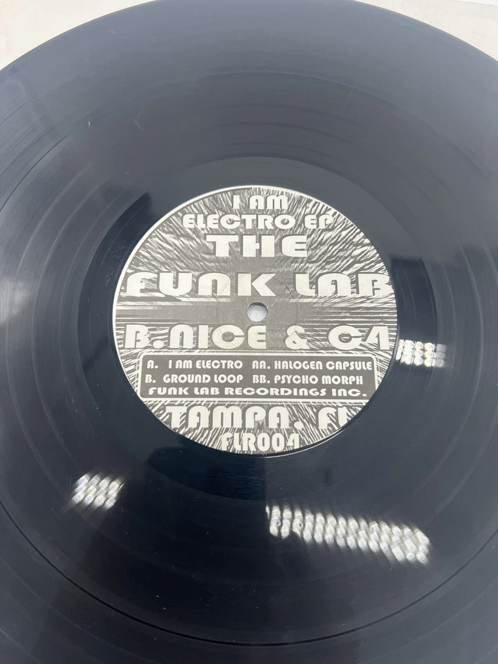 B-Nice & C4 I Am Electro 4 Track 12" Vinyl. VG+ Breaks - Image 1 of 4