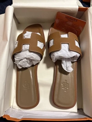 Auténticas sandalias para mujer HERMÈS Oran marrón talla EU41 US11 Foto 1 de 4