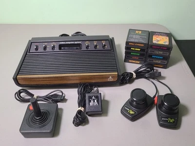 Consola Atari CX2600 'Heavy Sixer' Six Switch con 10 juegos + adaptador RF - PROBADA Foto 1 de 4