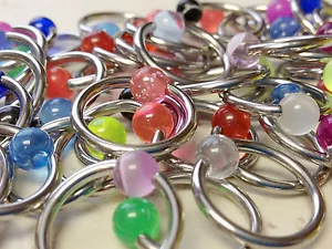 C#24 - 50pz Anelli Perline Cattive UV, Luminosi, Glitter 14g All'ingrosso Gioielli Corpo CBR - Foto 1 di 1