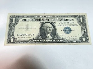 1957A $1 BLUE SEAL SILVER CERTIFICATE #LA-7503 IN VERY DECENT SHAPE AUYOU JUDGE; - Picture 1 of 2
