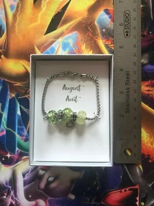 AUGUST  Birthstone Peridot Bangle LIKE NEW UNBRANDED - Foto 1 di 3