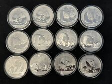 Китайские монеты Panda