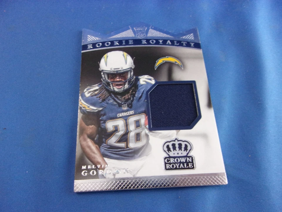 Melvin Gordon Crown Royale 2015 Rookie Royalty Materials Jersey RRM-MG 216/499 - Image 1 of 2