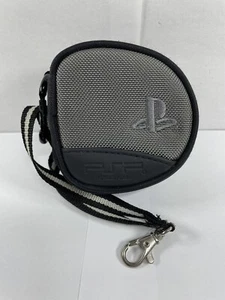 Custodia borsetta supporto rotondo grigio e nero ufficiale Sony PSP 8 giochi UMD - Foto 1 di 16