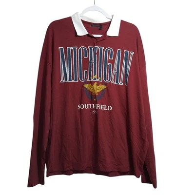 Camiseta polo de manga larga de gran tamaño con estampado de Michigan talla L de ASOS DESIGN Foto 1 de 4