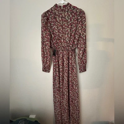 Vestido de manga larga floral exuberante Foto 1 de 4