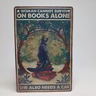 Funny Metal Sign  "A Woman Cannot Survive On Books Alone She Also Needs A Cat" 