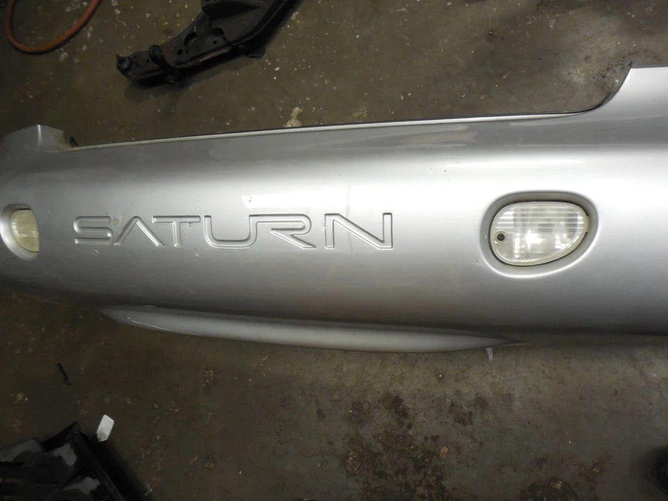 Задняя наружная серебристая панель бампера 00-02 Saturn SC1 SC2 3DR Coupe 21112474 - Изображение 1 из 4