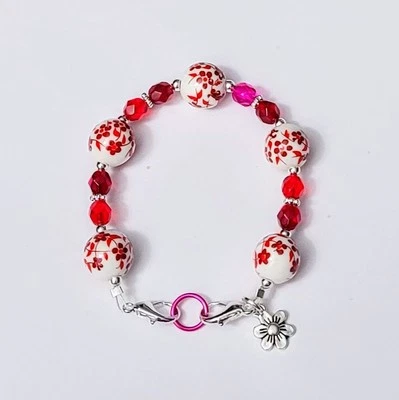 Pulsera de repuesto de identificación de alerta médica blanca con cuentas de cerámica de flores rojas Foto 1 de 3
