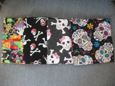 * Fat Quarters Fabric Bundle of  4 for Quilting HALLOWEEN SKULLS Pressed &folded - Image 1 of 4