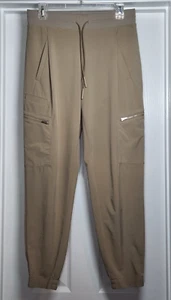 Pantalón de Viaje Athleta Go Far Caqui Beige Talla 4 Bolsillos Carga Elásticos - Imagen 1 de 10