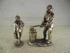 High Quality Silver Plated Metal Figure of a Man & Child Chopping Wood