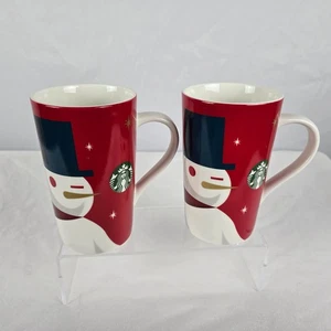 Starbucks Mugs Winking Snowman x 2 Holiday 2012 White, Red & Black 16 oz - Picture 1 of 8