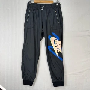 Nike Sportswear schwarz & neon Retro Print Swoosh Trainingshose Damengröße Medium - Bild 1 von 7