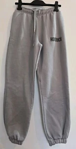 PANTALONES DE CHÁNDAL HOODRICH GRIS CON LOGO NEGRO TALLA XS TALLA 8 10 USADOS UNA VEZ - Imagen 1 de 2