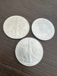 Lot of 3 - 1986 $1 American Silver Eagles - 1 Oz - 99.9% Verified - Lot 86-20 - Picture 1 of 24