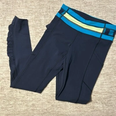 Lululemon leggings women's sz 2. Navy blue aqua waistband ruffle detail on leg - Image 1 of 4