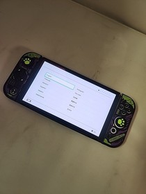 Nintendo Switch OLED 64GB Console with Joy-Con HEG-001 Purple/White Joycons