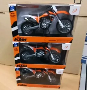 3 x NewRay KTM 350 F 1:12 Die-Cast Motocross MX Spielzeug Modell Bike orange war 65£ - Bild 1 von 2