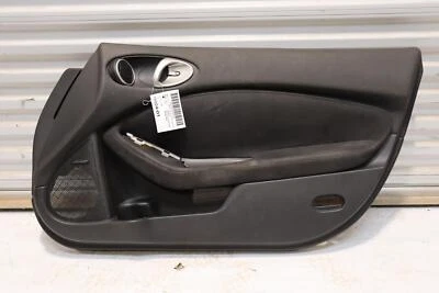 Nissan 370Z 2009-2017 cubierta de moldura de panel de puerta del lado del pasajero delantero derecho OEM Foto 1 de 4