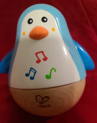 Hape Penguin Musical Wobbler | Colorful Wobbling Melody Penguin, Roly Poly Toy - Image 1 of 2