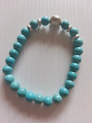 Bracciale di perline con gufo - Immagine 1 di 4